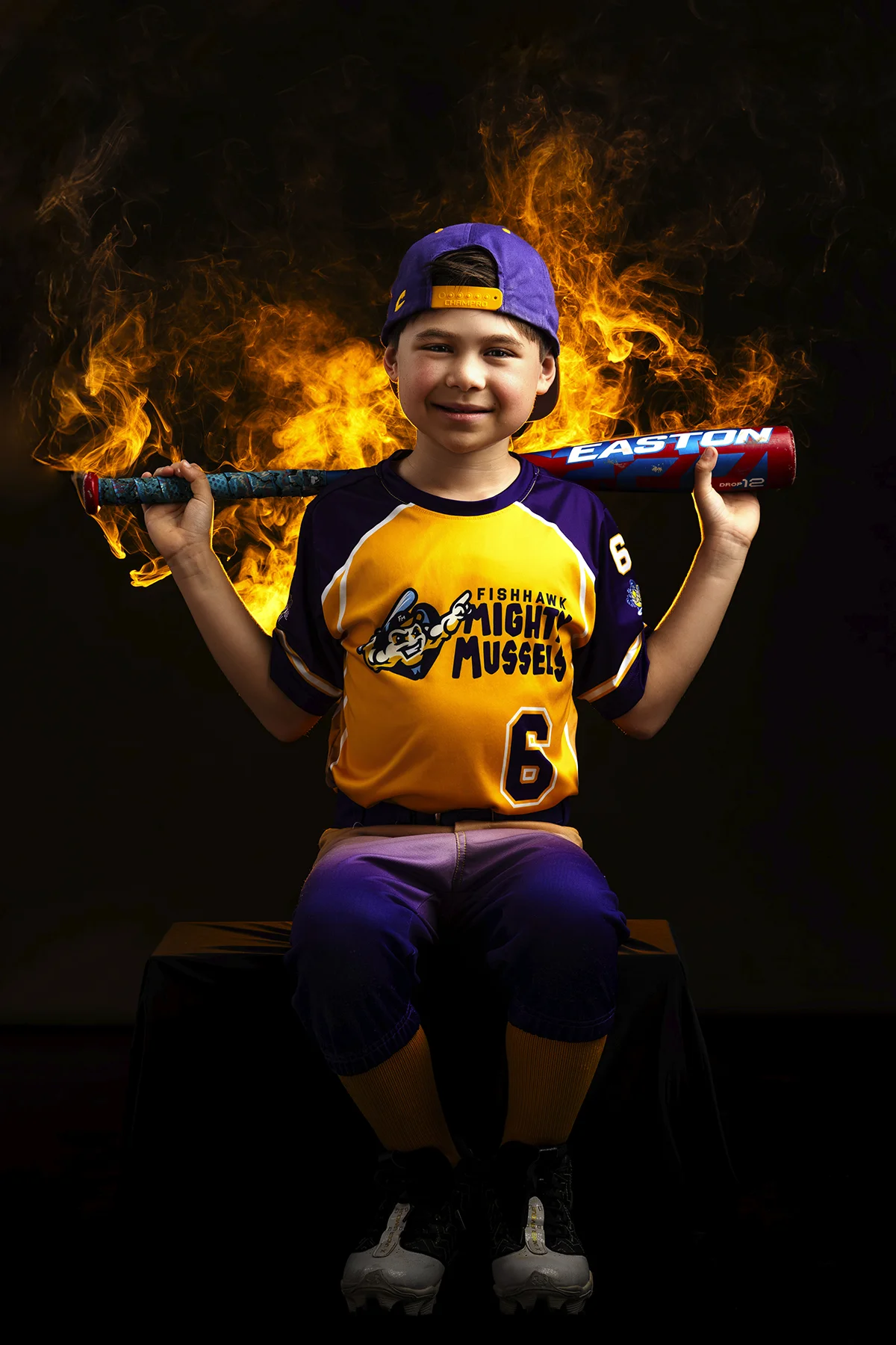 Baseball player with bat in fire and smoke atmosphere